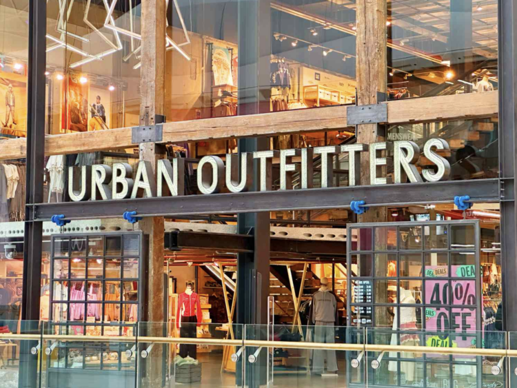 front of an Urban Outfitters Store in a mall